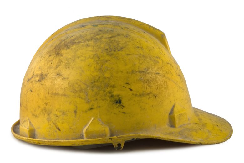 A dirty, yellow hardhat