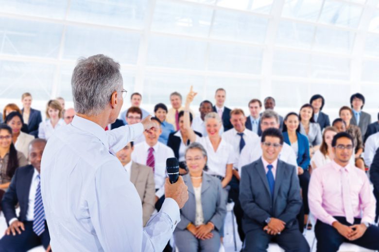 Conference speaker addressing the audience