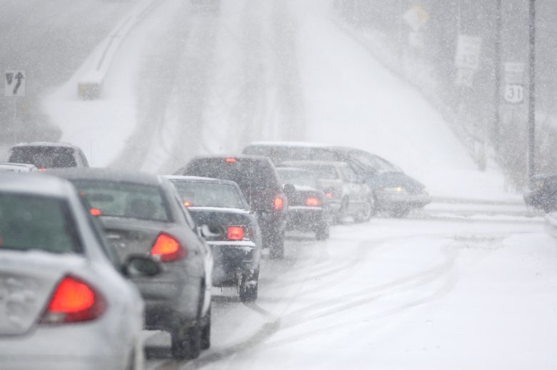 Winter driving line of cars, potential accident