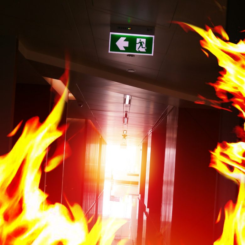 Fire in an office building with the fire exit in sight