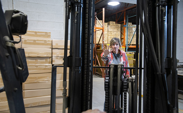 A warehouse and logistics safety topic. A close call. A forklift driver almost colliding with a pedestrian.