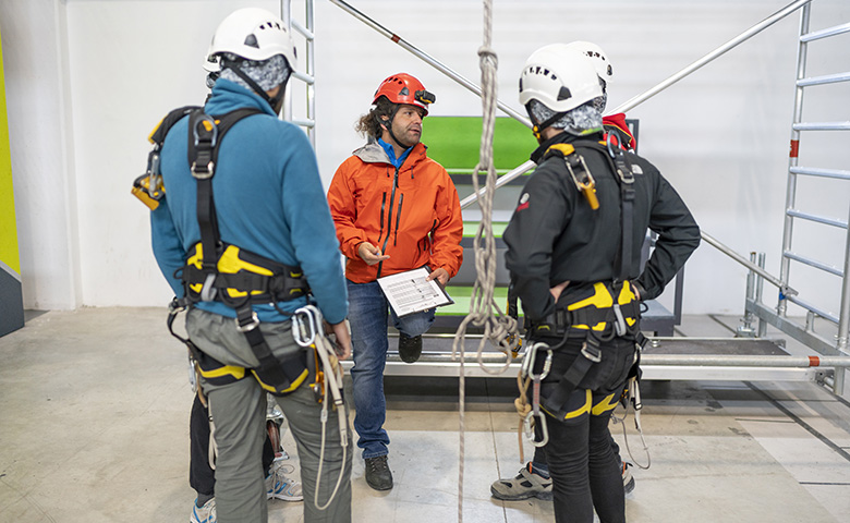 Toolbox talk on site while wearing fall protection