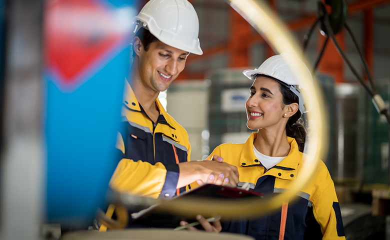 A new generation of engineers in a metal sheet factory. Studying work methods from supervisors or colleagues and studying by yourself be taught professionally
